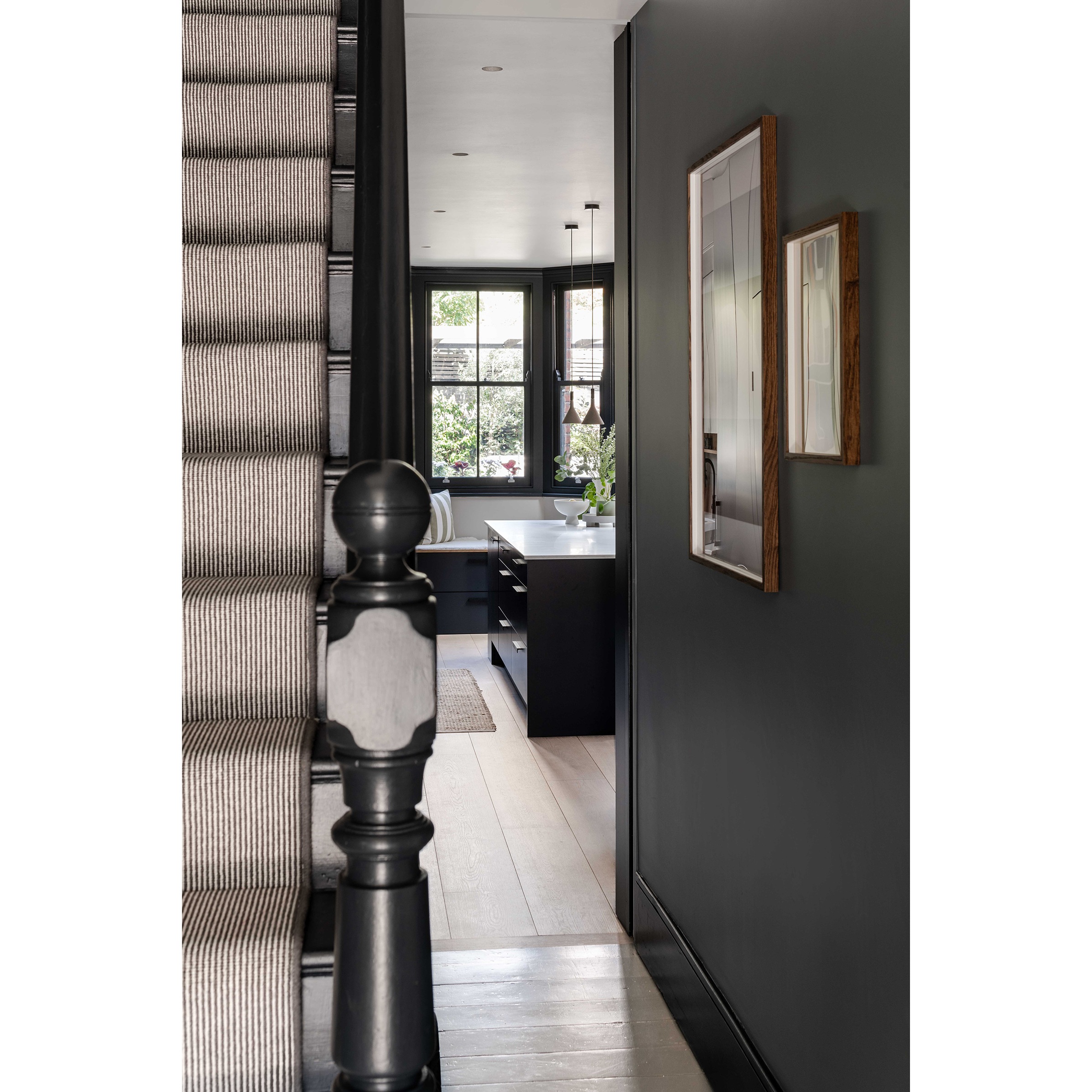 The staircase and eyeline through the house to the garden