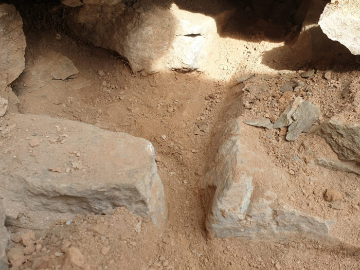 Close-up of a wall containing earth mortar