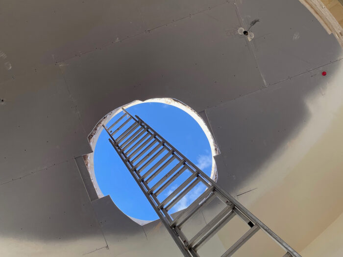 A view through the top of the tank to the sky