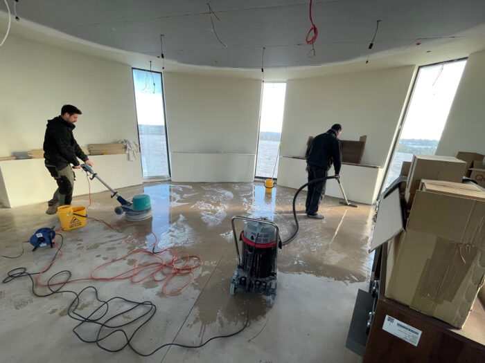 Polishing the concrete floors at the tower