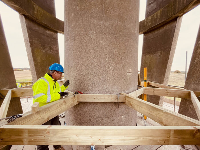 A workman at work inside Tonwell Tower