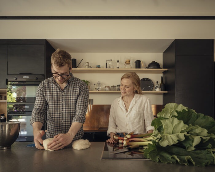 James and his wife baking bread in their new kitchen